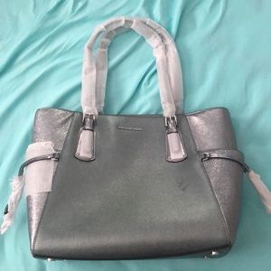 Brand new beautiful silver Michael Kors purse